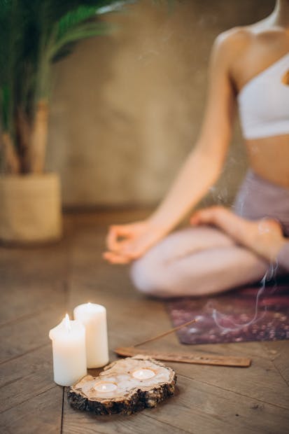 Calm meditation setup with candles and quiet atmosphere